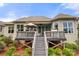 House with large deck and stairs leading to backyard at 15814 Vale Ridge Dr, Charlotte, NC 28278