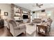Spacious living room with stone fireplace and built-in shelving at 15814 Vale Ridge Dr, Charlotte, NC 28278