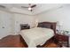 Bright bedroom with king-size bed and hardwood floors at 13950 Cinnabar Pl, Huntersville, NC 28078