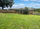 Brick ranch house with covered porch and landscaped yard at 8819 Richardson King Rd, Waxhaw, NC 28173