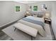 Spacious bedroom with neutral decor and wood-look floors at 8819 Richardson King Rd, Waxhaw, NC 28173