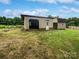 Detachable garage and storage shed in the backyard at 8819 Richardson King Rd, Waxhaw, NC 28173