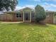 Brick ranch house with covered porch and landscaped yard at 8819 Richardson King Rd, Waxhaw, NC 28173