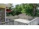 Wooden deck with lattice railings and leafy trees at 93 13Th Se St, Hickory, NC 28602