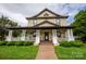 Two-story house with a large front porch and landscaping at 102 2Nd Sw St # 1, Catawba, NC 28609