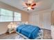 Bright bedroom with a double bed, ample closet space, and ceiling fan at 100 Nottingham Way, Wadesboro, NC 28170