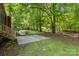 Landscaped backyard with patio and wooden fence at 9808 Warwick Cir, Charlotte, NC 28210