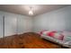 Bedroom with wood floors and twin bed at 205 Bates Ave, Cherryville, NC 28021