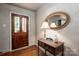 Inviting entryway with hardwood floors and mirror at 205 Bates Ave, Cherryville, NC 28021