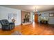 Living room with hardwood floors, fireplace and large windows at 205 Bates Ave, Cherryville, NC 28021