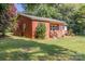 Brick ranch house with additional building and a yard at 146 N Sutton Rd, Fort Mill, SC 29708