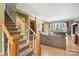 Wood staircase with wrought iron railings leading to upper level at 118 Broadbill Dr, Mooresville, NC 28117