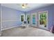 Bedroom with sliding glass doors leading to a deck at 118 Broadbill Dr, Mooresville, NC 28117