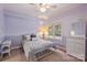 Bright bedroom with a double bed, window, and dresser at 118 Broadbill Dr, Mooresville, NC 28117