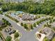 Aerial view of community with homes, streets, and amenities at 16015 Vale Ridge Dr # 133, Charlotte, NC 28278