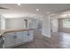 Open concept kitchen with an island and white cabinets at 55 Shannon Park Cir, Taylorsville, NC 28681