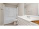 Clean bathroom with a white vanity, bathtub, and shower at 1532 Downs Ave, Charlotte, NC 28205