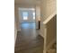 View of the entryway with wood-look flooring and a view into the living area at 1223 Dodd St, Shelby, NC 28152