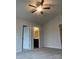 Main bedroom with carpeting, a ceiling fan, and an ensuite bathroom at 1223 Dodd St, Shelby, NC 28152