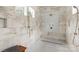 Large walk-in shower with marble tile and multiple shower heads at 514 Billy Howey Rd, Waxhaw, NC 28173