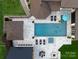 Aerial view of the property, showcasing pool and landscaping at 514 Billy Howey Rd, Waxhaw, NC 28173