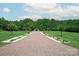 Long driveway leading to a beautiful home at 514 Billy Howey Rd, Waxhaw, NC 28173