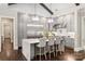 Modern kitchen with gray cabinetry, stainless steel appliances, and a large island at 514 Billy Howey Rd, Waxhaw, NC 28173