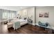 Spacious bedroom with two twin beds, ample natural light, and hardwood floors at 514 Billy Howey Rd, Waxhaw, NC 28173