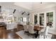 Open concept dining room with hardwood floors and a view of the kitchen at 514 Billy Howey Rd, Waxhaw, NC 28173