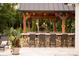 Stone outdoor bar with seating, perfect for entertaining at 514 Billy Howey Rd, Waxhaw, NC 28173