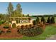 Waxhaw Landing community entrance with landscaping at 1483 Honey Trl, Monroe, NC 28112