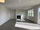 Bright living room with hardwood floors and a fireplace at 1483 Honey Trl, Monroe, NC 28112