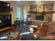 Finished basement with stone fireplace and leather seating at 301 Agnew Rd, Mooresville, NC 28117