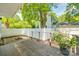 Brick patio with fire pit and wooden deck at 300 Congress N St, York, SC 29745