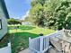 Spacious backyard with grassy area, deck, and storage building at 1586 Kenlane Dr, Hickory, NC 28601