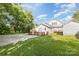 Home's rear elevation, highlighting the deck and expansive yard at 205 Martin Luther King Jr Ave, Salisbury, NC 28144