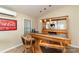 Built-in home bar with granite countertop and pendant lighting at 205 Martin Luther King Jr Ave, Salisbury, NC 28144