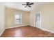 Simple bedroom with hardwood floors and a window at 205 Martin Luther King Jr Ave, Salisbury, NC 28144