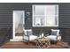 Relaxing deck with two comfy chairs and a small table at 8009 Elevate Ct, Charlotte, NC 28205