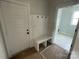 Mudroom with built-in bench, hooks, and access to laundry room at 4808 Glen Stripe Dr # Cal0036, Indian Trail, NC 28079