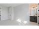 Spacious bedroom with ensuite bathroom and neutral decor at 8009 Elevate Ct, Charlotte, NC 28205