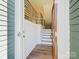 Bright entryway with hardwood floors and modern staircase at 8009 Elevate Ct, Charlotte, NC 28205