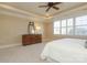 Bright bedroom with plantation shutters, a ceiling fan, and ample space for furniture at 3318 Indian Meadows Ln, Charlotte, NC 28210