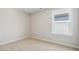 Well-lit bedroom with neutral walls and carpeted floors at 14048 Lake Home Ln, Charlotte, NC 28278