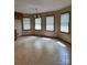 Dining area with tile floor and large windows at 2232 Stallings Rd, Matthews, NC 28104