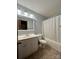 Clean bathroom with tub, shower, and vanity at 2232 Stallings Rd, Matthews, NC 28104