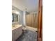 Bathroom features a tub, shower, and vanity at 2232 Stallings Rd, Matthews, NC 28104