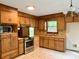 Kitchen with wood cabinets and stainless steel appliances at 2232 Stallings Rd, Matthews, NC 28104