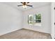 Well-lit bedroom featuring double windows and ceiling fan at 1332 Caldwell St, Statesville, NC 28677