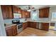 Kitchen with wood cabinets and stainless steel appliances at 171 Timberbrook Ln # 16, Statesville, NC 28625